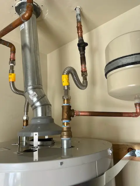 Water heater installation and plumbing repair in Roulo